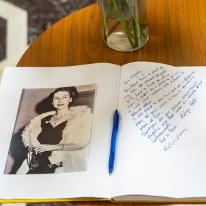 a book and a vase of flowers