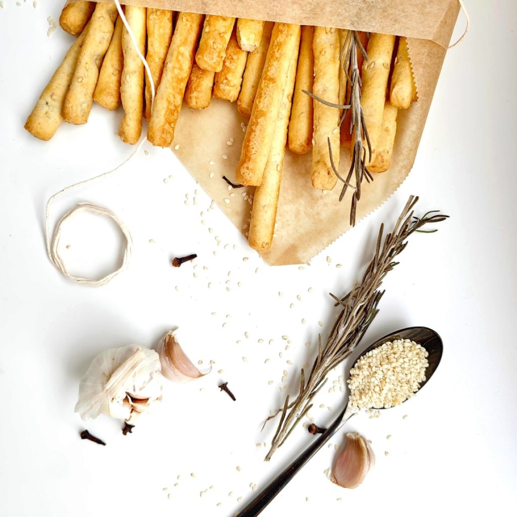 a bunch of french fries sitting on top of a cutting board