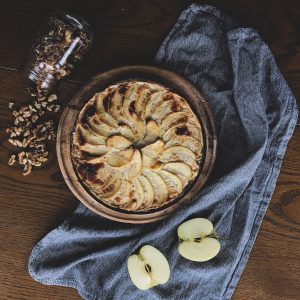 brown and white round cake on black textile