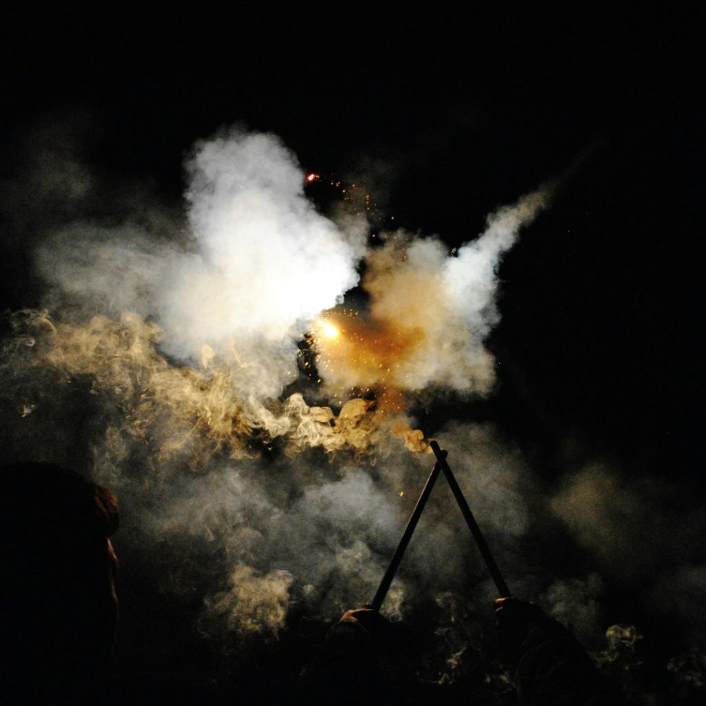 white smoke during night time