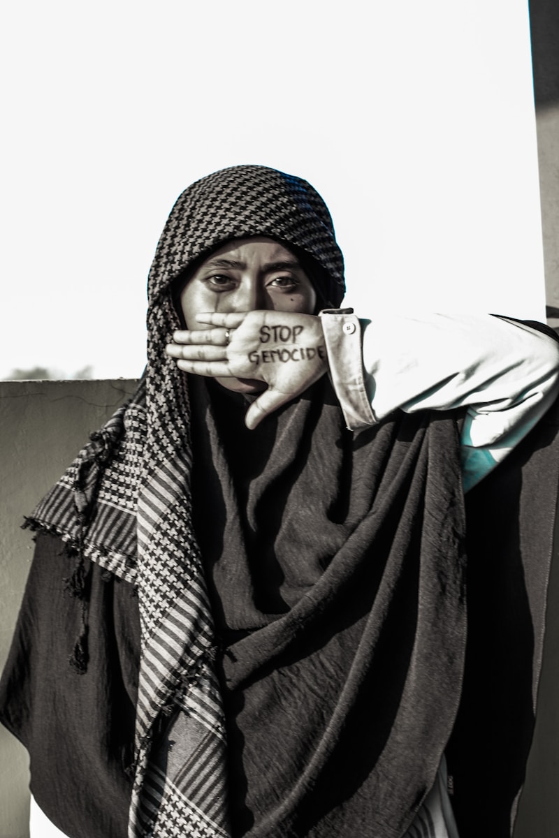 A woman with a scarf covering her face